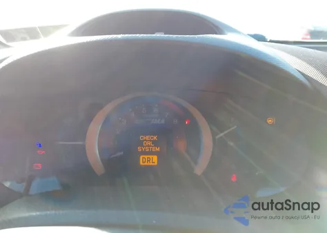 2011 Honda Insight from USA, damaged, VIN JHMZE2H31BS008200